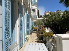 Beautiful garden apartment steps from the beach